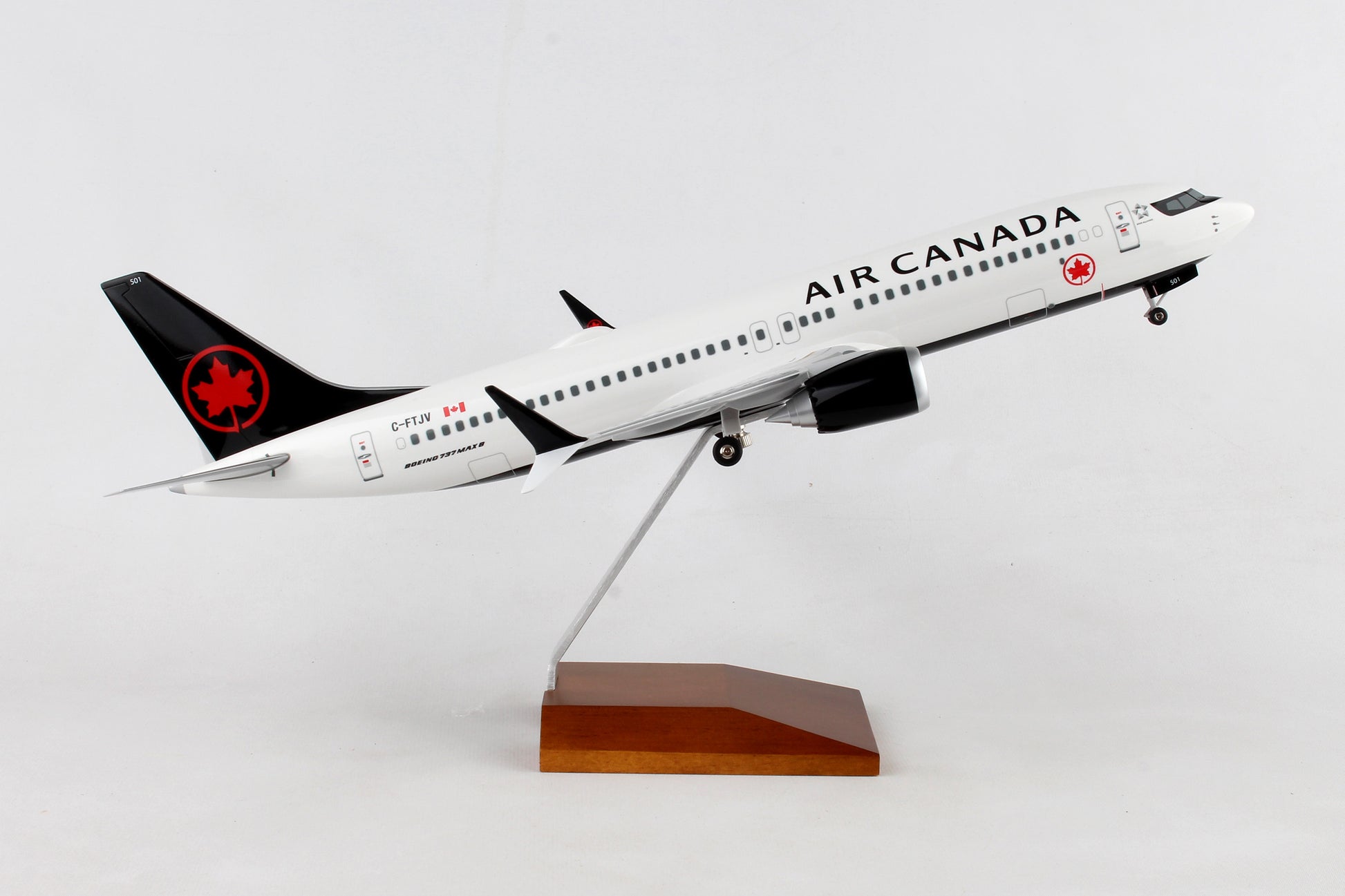 SKR8279 SKYMARKS AIR CANADA 737MAX8 1/100 W/WOOD STAND & GEAR - SkyMarks Models